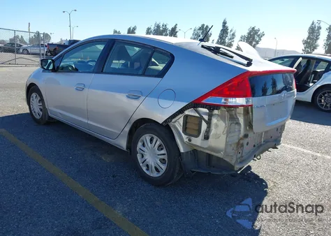 2010 Honda Insight Lx from USA, damaged, VIN JHMZE2H5XAS011239